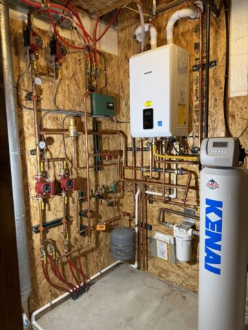 Navien tankless water heater and Kenai whole-home water filtration system professionally installed in Whitefish Montana